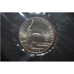 1986-D US Liberty Nation Of Immigrant Commemorative Half Dollar In Display Box; UNC; EST. $3-5
