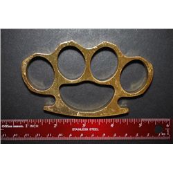 Brass Knuckles; EST. $30-60