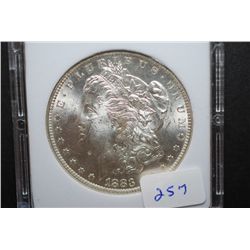 1883-O US Silver Morgan $1; MCPCG Graded MS62; EST. $50-70