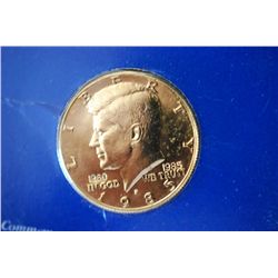 1985-P US Kennedy Half Dollar In Blister Pack With History; CLAD Gold; EST. $3-6