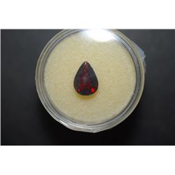 Teardrop-Shaped Dark Red/Orange Gemstone; EST. $10-20