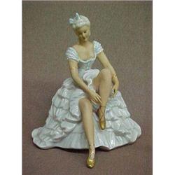 8" German Porcelain Figurine of Seated Lady, White Dress