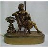 Image 1 : Brass figural lamp, seated gentleman in chair with table