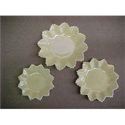 Set of three Belleek graduated leaf butter plates