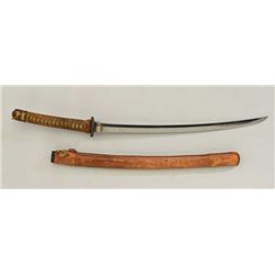 Japanese Wakasashi or medium size sword.  Handmade blade with WWII type mounts. The  blade measures 