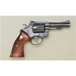 Smith & Wesson 5-screw DA hand ejector  revolver, .22LR cal., 4” barrel, blue finish,  checkered woo
