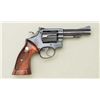 Image 4 : Smith & Wesson 5-screw DA hand ejector  revolver, .22LR cal., 4” barrel, blue finish,  checkered woo