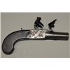 Image 1 : Center hammer Flintlock pistol of muff or  pocket size signed “Harcourt, Norwich”.  The  metal surfa