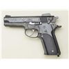Smith & Wesson Model 559, 9mm semi-automatic  pistol with steel frame and factory A  engraved. Seria