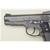 Image 3 : Smith & Wesson Model 559, 9mm semi-automatic  pistol with steel frame and factory A  engraved. Seria
