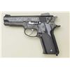 Image 4 : Smith & Wesson Model 559, 9mm semi-automatic  pistol with steel frame and factory A  engraved. Seria