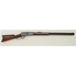 Winchester Model 1876 rifle, 28” round  barrel, 45-60 caliber, full magazine, rifle  butt, second mo