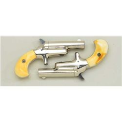 Pair of Colt 3rd Model Derringers in 41 cal  rim fire, nickel plated ivory grips with  original to t