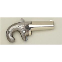Colt No. 1 41 cal derringer nickel plated in  very good plus original condition, serial  #4310.  The