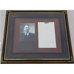 Professionally framed and matted display  including an original page 3 of a Court  document transfer