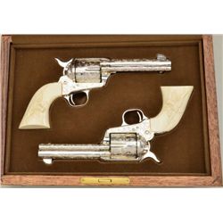 Pair of Colt Single Action Army revolvers  factory  “D” engraved  by Jan Gwinell with  carved ivory 
