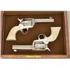 Pair of Colt Single Action Army revolvers  factory  “D” engraved  by Jan Gwinell with  carved ivory 