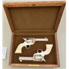 Image 2 : Pair of Colt Single Action Army revolvers  factory  “D” engraved  by Jan Gwinell with  carved ivory 