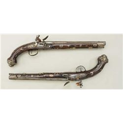 A pair of high quality French Flintlock High  Art Holster size Pistols, locks are inscribed  “ VERGN
