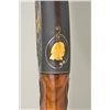 Image 9 : Winchester Model 12, 20 gauge pump action  shotgun fully and finely engraved in gold  inlaid by “Jud