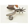 Image 7 : High grade single Mexican spur from late 19th  century showing fancy silver work and  pitiado strap 