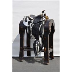 Fancy silver mounted parade saddle by  Schoelkopf with “Jumbo Brand” made in Texas,  the leather is 