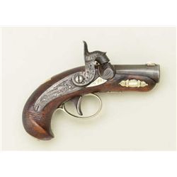 Deringer percussion single shot, .41 cal., 2”  barrel, silver bands at breech, checkered  wood stock