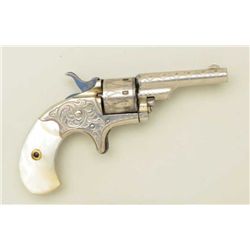 Colt 1872, 22 cal. 7 shot open top revolver  N.Y. style period scroll engraved, nickel  plated, pear