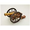 Image 2 : Antique small signal or noise maker cannon on  hand carved wood carriage with iron wheels,  approx. 