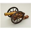 Image 3 : Antique small signal or noise maker cannon on  hand carved wood carriage with iron wheels,  approx. 
