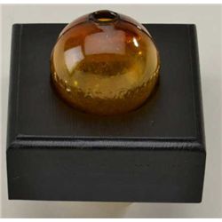 Glass target ball embossed “Ira Paine’s  filled ball pat Oct. 23 1877” amber color,  very good to ne
