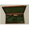 Original mid 19th century English pistol case  with veneered mahogany exterior and deluxe  brass mou