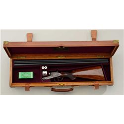 E.J. Churchill "The Premier Quality" full  side lock, 12 gauge, S x S shotgun showing  30" barrels, 
