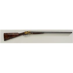 Exhibition quality ornately gold inlaid full  side lock double barrel shotgun by John  Wilkes, 79 Be
