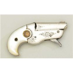 Hopkins & Allen 22 short cal vest pocket  Derringer, nickel plated, factory engraved,  medallion pea