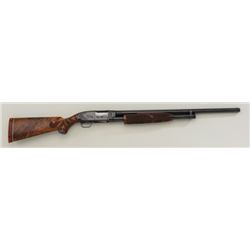 Winchester Model 12 custom upgraded and  engraved pump action shotgun in 12 gauge with  26” skeet ma