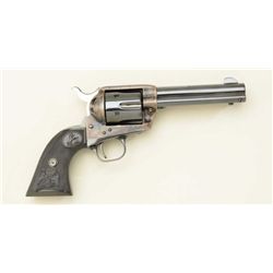 Colt SAA revolver, .44-40 cal., 4-3/4”  barrel, blue and case hardened finish,  checkered black hard