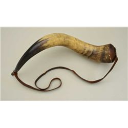 19th century American style powder horn of  large proportions with original period strap  and commer
