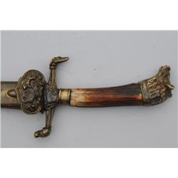 German Boar Hunting Sword with fancy cast  mounts, etched blade and scabbard circa late  19th to ear