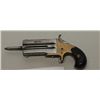 Frank Wesson .41 caliber over & under  derringer with original sliding bayonet. The  pistol remains 