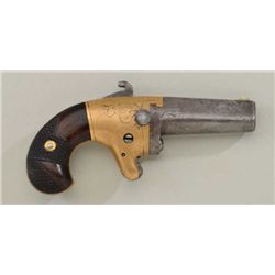 National second model derringer with brass  frame in .41 caliber rimfire. Serial #5244.  The derring