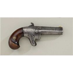 National second model derringer with iron  frame and late production era showing shell  extractor in