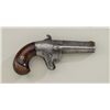 Image 1 : National second model derringer with iron  frame and late production era showing shell  extractor in