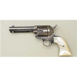 Colt SAA revolver, .41 cal., 4-3/4” barrel,  blue and case hardened finish, raised carved  pearl gri