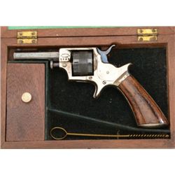 Cased small Tranter’s patent spur trigger  revolver, .22 cal., 2-1/2” barrel, blue and  nickel finis