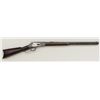 Winchester Model 1873 lever action rifle, .32  WCF cal., 24” octagon barrel, blue finish,  wood stoc
