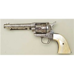 Colt SAA revolver, .45 cal., 5-1/2” barrel,  Western style fancy scroll engraving,  beautiful raised