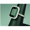 Dazzling 18 karat white gold ladies high  quality custom made ring. Set with a fine  green emerald c