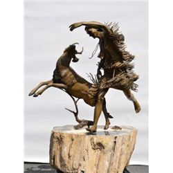 Pair of bronze statues by Doug Van Howd  numbered 1 of 50. Showing Indian brave and  Eagle and Maide