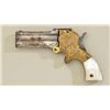 Marston three barrel derringer, period  engraved, .32 cal., 3” barrels, silver and  gold wash finish